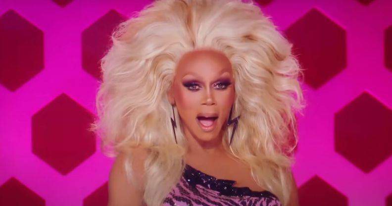 RuPaul on the drag race judging panel looking shocked and gagged.