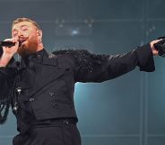 Sam Smith performing in an all-black outfit in the Netherlands