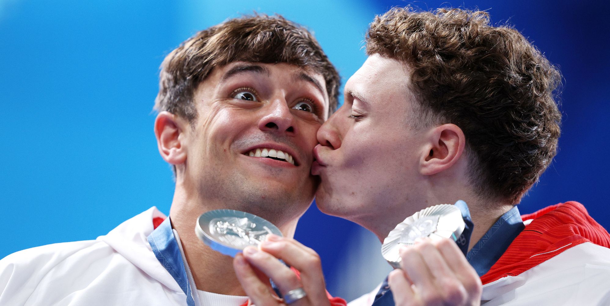 Noah Williams kisses Tom Daley after Paris 2024 win