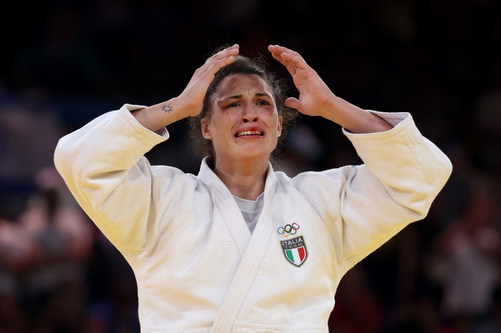 Alice Bellandi of Team Italy celebrates winning against Inbar Lanir of Team Israel during the Judo Women -78 kg Final on day six of the Olympic Games Paris 2024