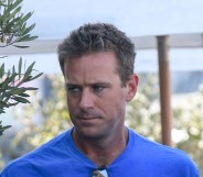 Armie Hammer is seen on July 18, wearing a blue t shirt