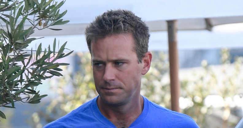 Armie Hammer is seen on July 18, wearing a blue t shirt