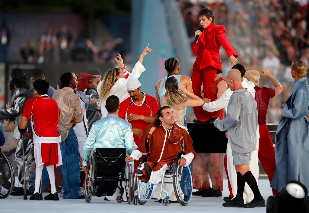 Christine and the Queens performs with dancers during the opening act at the opening ceremony of the Paris 2024 Summer Paralympic Games. 