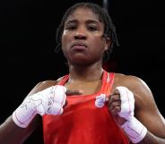 Cindy Ngamba making a fist in a Olympic ring.