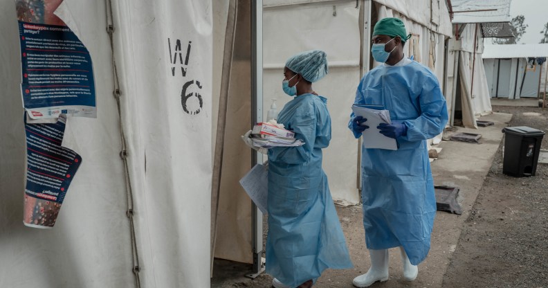 Health workers walk between wards at the Mpox treatment centre at Nyiragongo General Referral Hospital.