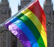 Mormon church with LGBTQ flag in front