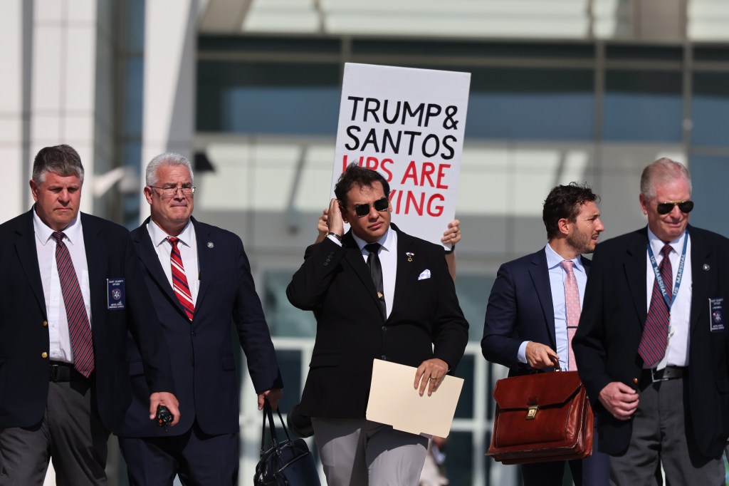 George Santos leaves US District Court Eastern District of New York Long Island Courthouse after he pleaded guilty to wire fraud and aggravated identity theft weeks before his federal trial was set to begin. 