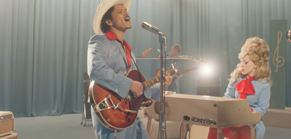 Lady Gaga and Bruno Mars in the music video for "Die With A Smile"