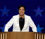 Former Trump White House Press Secretary Stephanie Grisham speaks on stage during the second day of the Democratic National Convention