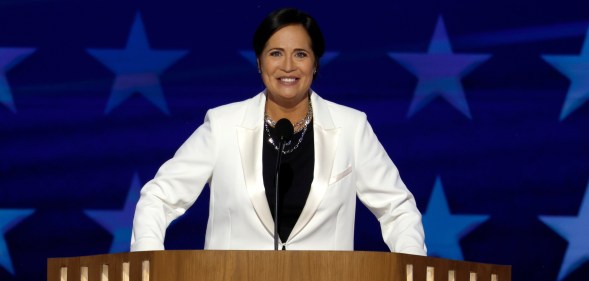 Former Trump White House Press Secretary Stephanie Grisham speaks on stage during the second day of the Democratic National Convention