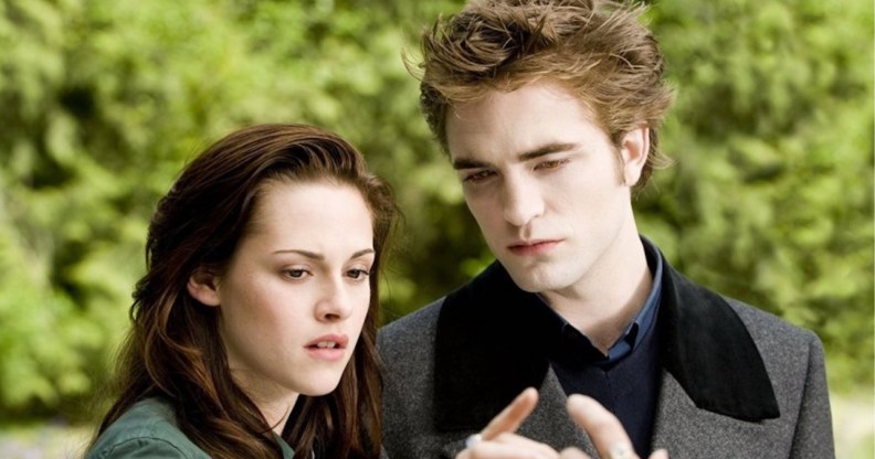 Bella and Edward in Twilight still, looking at their hands connecting