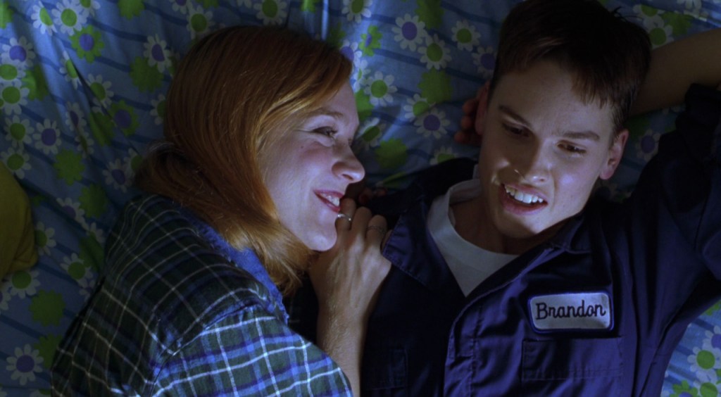 Chloë Sevigny and Hilary Swank in Boys Don't Cry lying togehter in bed.