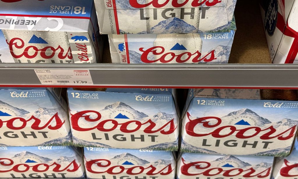 Packs of Coors Light on shop shelves.