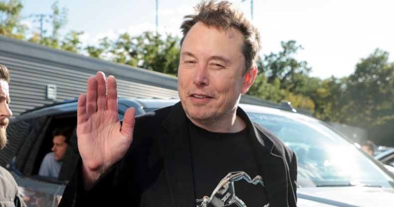 Elon Musk waving to the camera