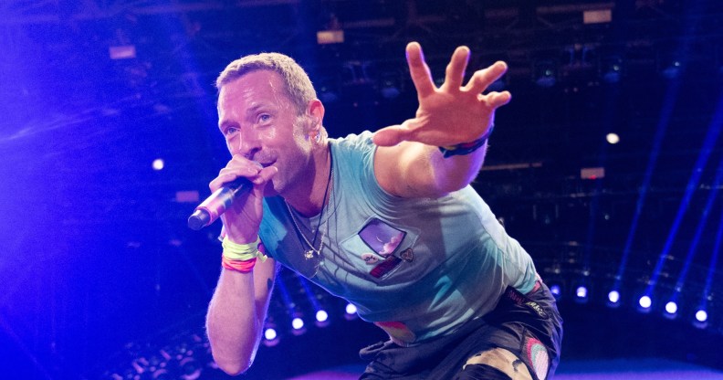 Chris Martin of Coldplay performs as the band headline the Pyramid stage during day four of Glastonbury Festival