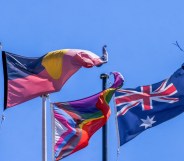 Australian Aboriginal flag, Pride flag, and Australian flag.