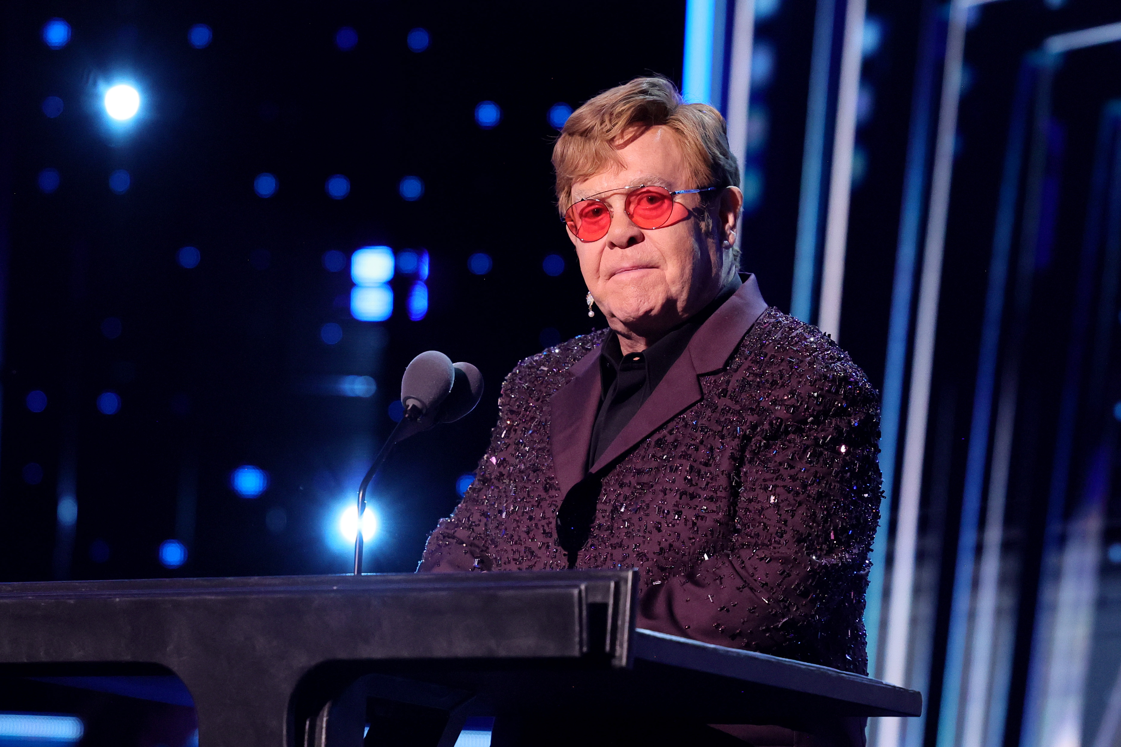 Elton John says a ‘severe’ eye infection left him with ‘limited vision’