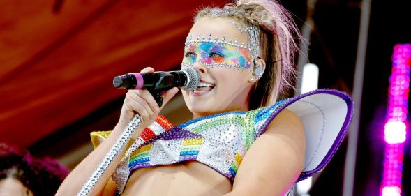 JoJo Siwa performs onstage during LA Pride in the Park at Los Angeles Historical Park on June 08, 2024 in Los Angeles, California