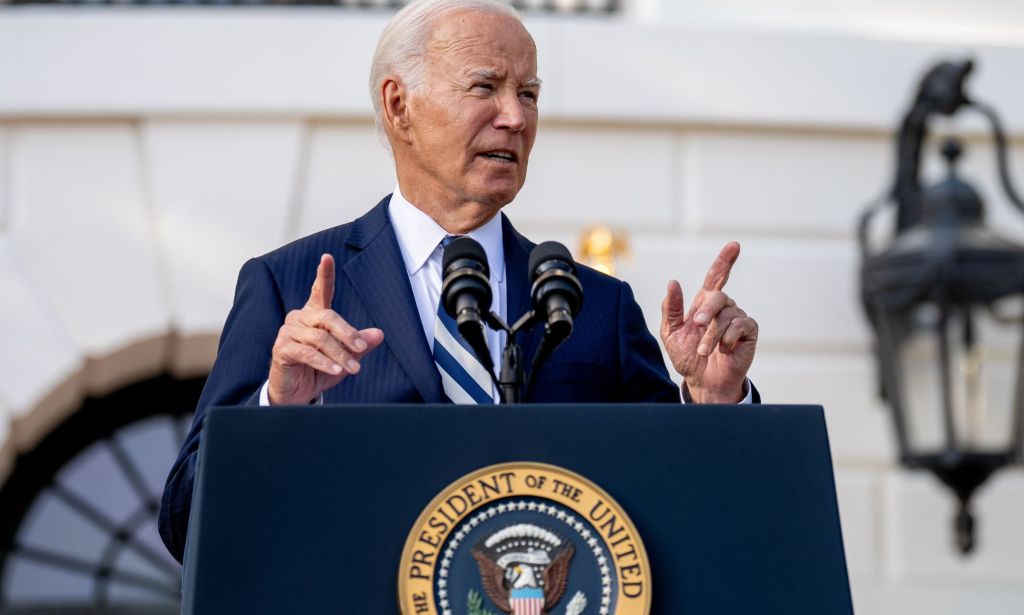 Joe Biden speaking from a podium outside the White House. 