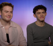 Kit Connor (left) and Joe Locke (right) spoke to PinkNews ahead of Heartstopper season three. (Netflix/PinkNews)