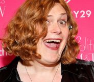 Lily Wachowski smiling at a red carpet event.