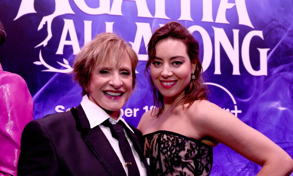 Patti LuPone in a suit and Aubrey Plaza in a floral emroidered dress at the launch event for Marvel Television's Agatha All Along