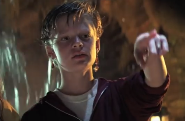 Martha Plimpton in The Goonies points to something beyond the screen