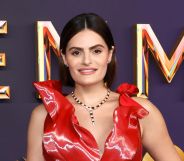 Nava Mau in a red gigi goode dress at the emmy awards red carpet