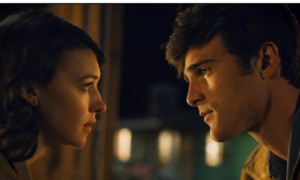 Daisy Edgar-Jones and Jacob Elordi staring intently at eachother in a still of On Swift Horses