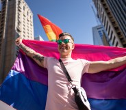 Man holding bisexual pride flag