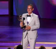 Greg Berlanti accepting the Governor's Award at the 76th Emmy's for queer representation, including the Dawson's Creek gay kiss