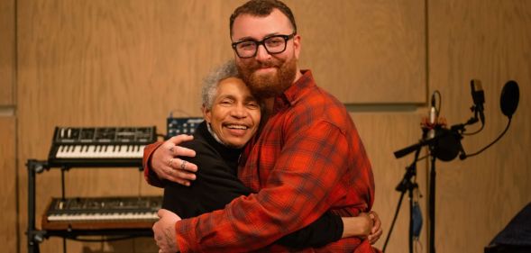 Beverly Glenn-Copeland and Sam Smith hug in a music studio