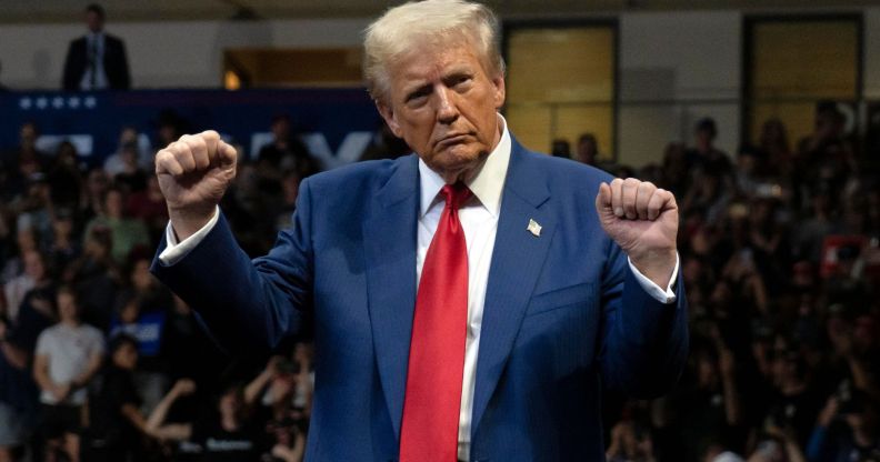 U.S. Republican presidential nominee, former President Donald Trump dances during a campaign rally at Findlay Toyota Center on October 13, 2024 in Prescott Valley, Arizona