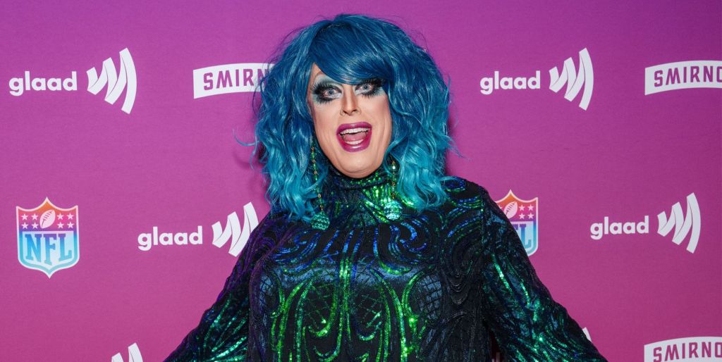 Drag Race star Tempest DuJour on the red carpet of an NFL and GLAAD event in 2023.