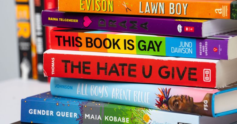 Stack of frequently-banned books in the US including Gender Queer by Maia Kobabe