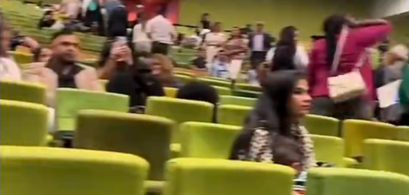 Students stage walk-out at Australian Catholic University graduation after a speech by Joseph de Bruyn