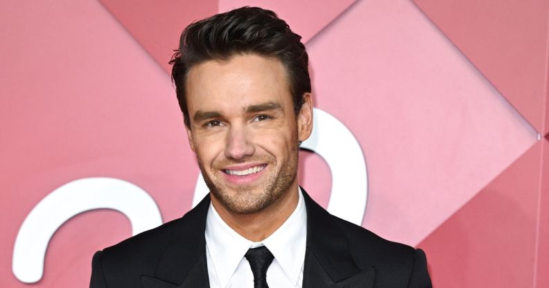 Liam Payne smiles on a red carpet in 2022.