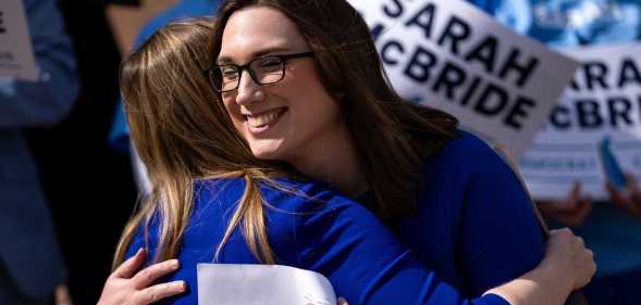 Democratic congressional candidate from Delaware Sarah McBride hugs Delaware State Treasurer Colleen Davis.