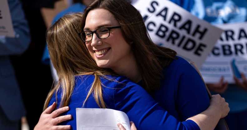 Democratic congressional candidate from Delaware Sarah McBride hugs Delaware State Treasurer Colleen Davis.