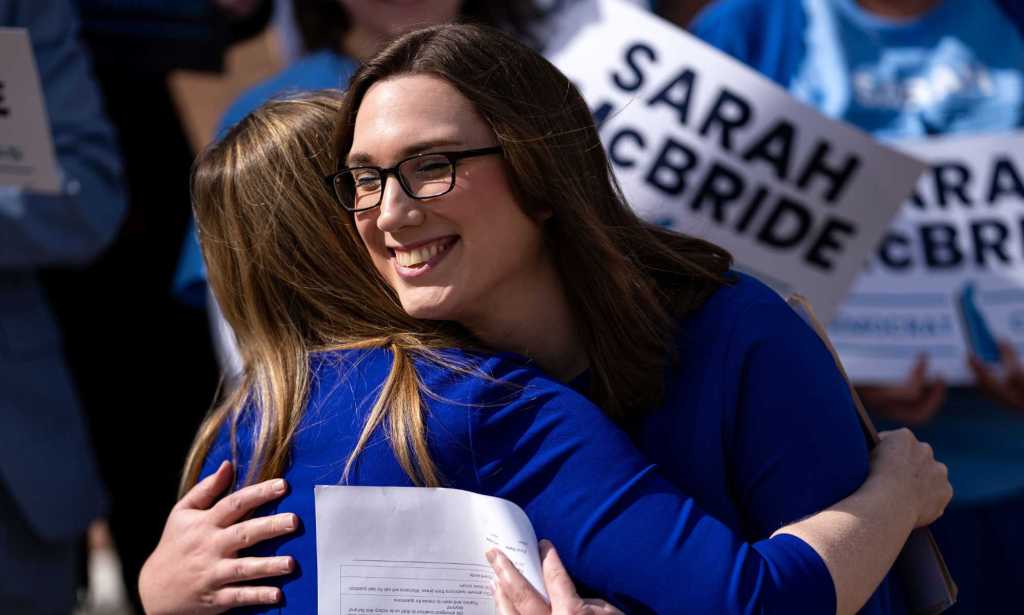 Democratic congressional candidate from Delaware Sarah McBride hugs Delaware State Treasurer Colleen Davis.