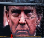 A digital billboard truck sponsored by The Lincoln Project tries to park outside a campaign rally with Republican presidential candidate and former President Donald Trump