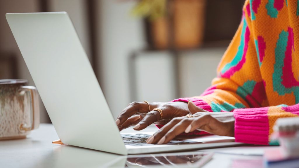 Stock image of a person using a laptop