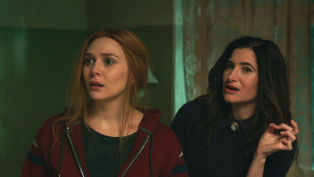 Elizabeth Olsen as Wanda Maximoff and Kathryn Hahn as Agatha Harkness in WandaVision.