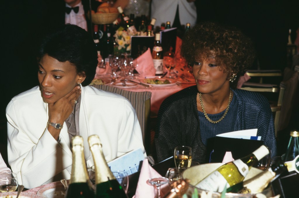 Robyn Crawford, left, and American singer Whitney Houston