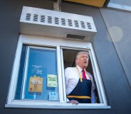 Donald Trump leaning out of the drive-thru window at McDonald's in Pennsylvania