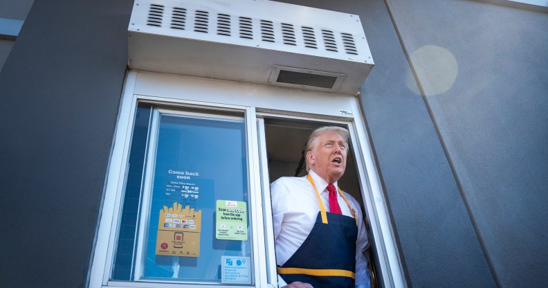 Donald Trump leaning out of the drive-thru window at McDonald's in Pennsylvania