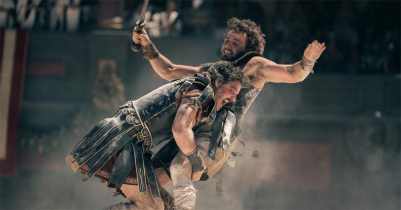 Fight scene from Gladiator II, Paul Mescal is seen tackling Pedro Pascal in the arena