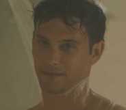 Monsters star Cooper Koch as Erik Menendez during a full-frontal naked shower scene