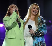 Natasha Hamilton (left) and Liz McClarnon (right) performing as Atomic Kitten