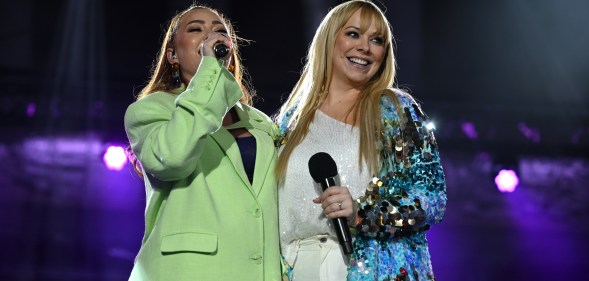 Natasha Hamilton (left) and Liz McClarnon (right) performing as Atomic Kitten